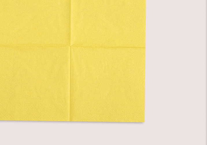 Colored yellow paper napkin